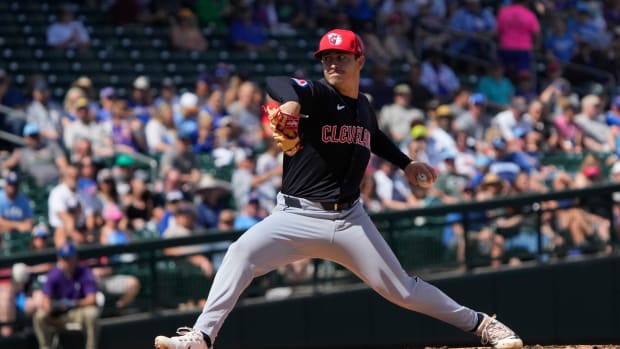 Mar 3, 2024; Mesa, Arizona, USA; Cleveland Guardians pitcher Logan Allen (41) throws against the Chicago Cubs in the first inning at Sloan Park. Mandatory Credit: Rick Scuteri-USA TODAY Sports